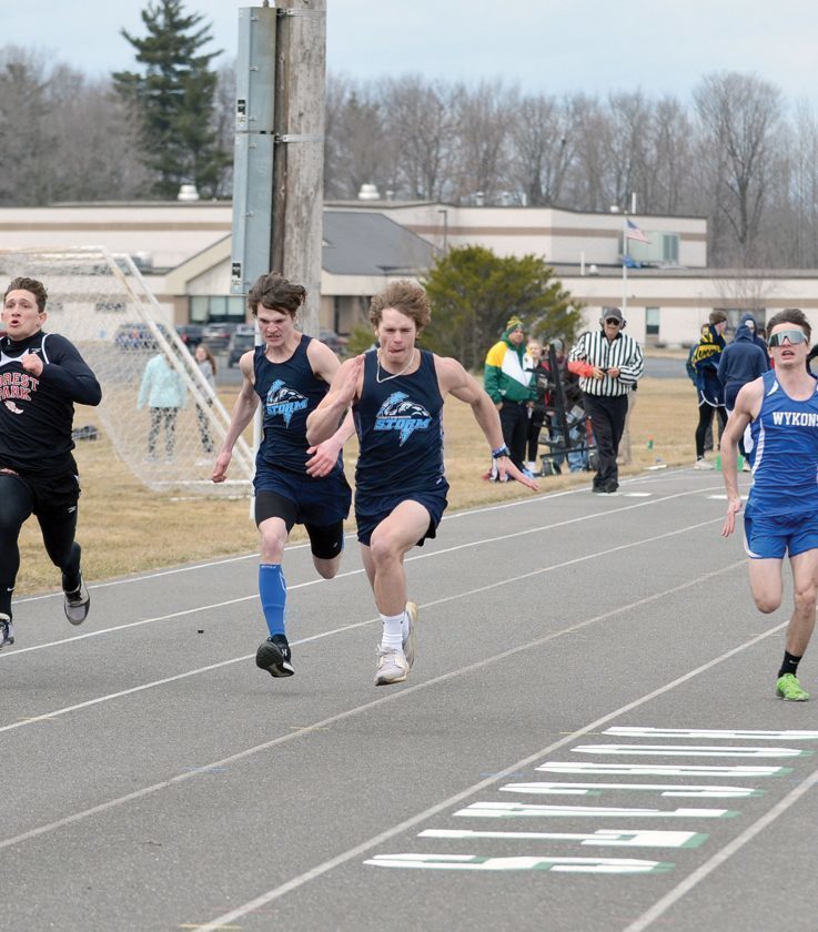 Florence senior sprinter Patrick Milan, at right, outruns the field, including one of his own teammates with the Northwoods Storm