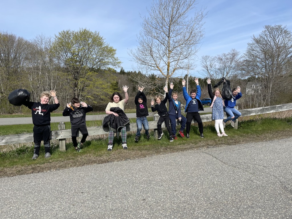 Students celebrating trash pickup