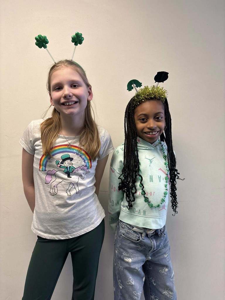 Two students dressed for St. Patrick's Day.