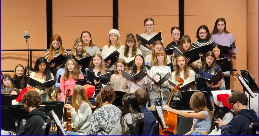 Choir students performing for a holiday show
