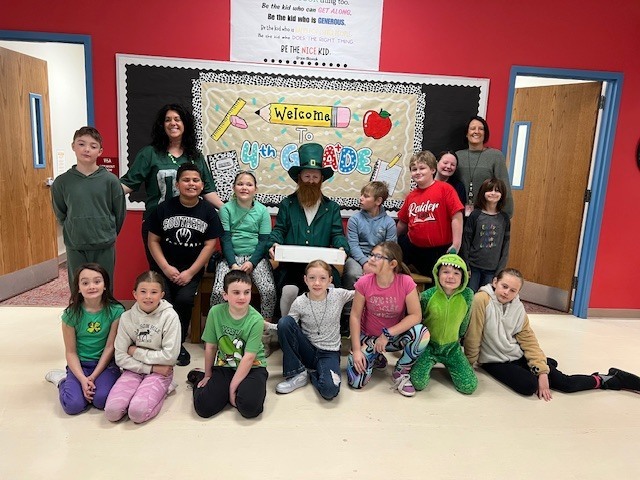 A class picture with a leprechaun 