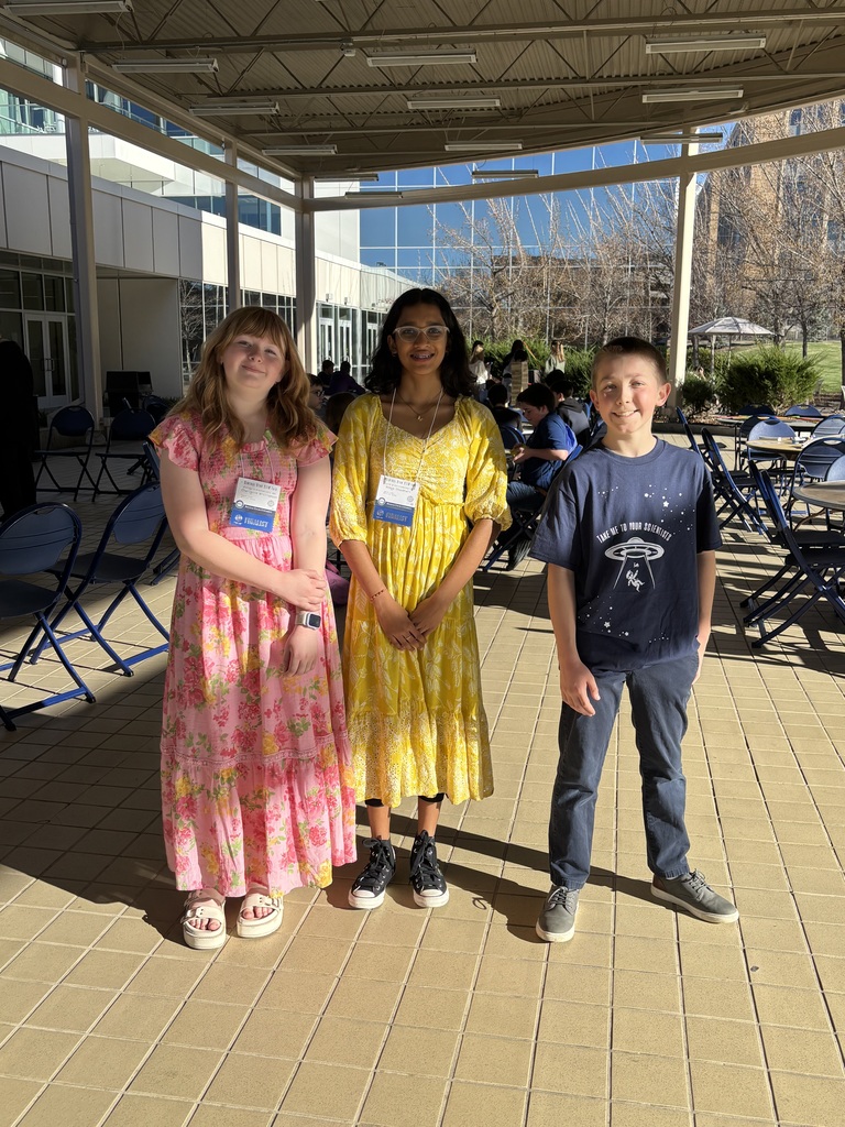 boy and two girls at science fair