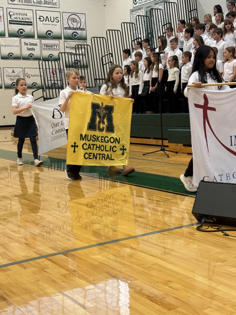 $th graders carrying MCC sign