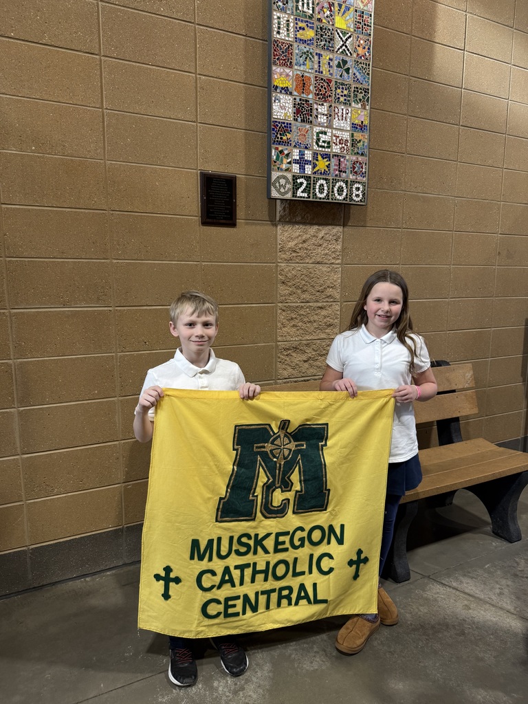 4th graders holding MCC sign