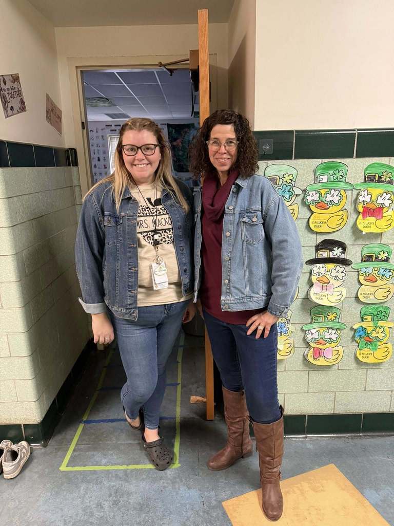 Two teachers wearing denim on denim for 90s day. 