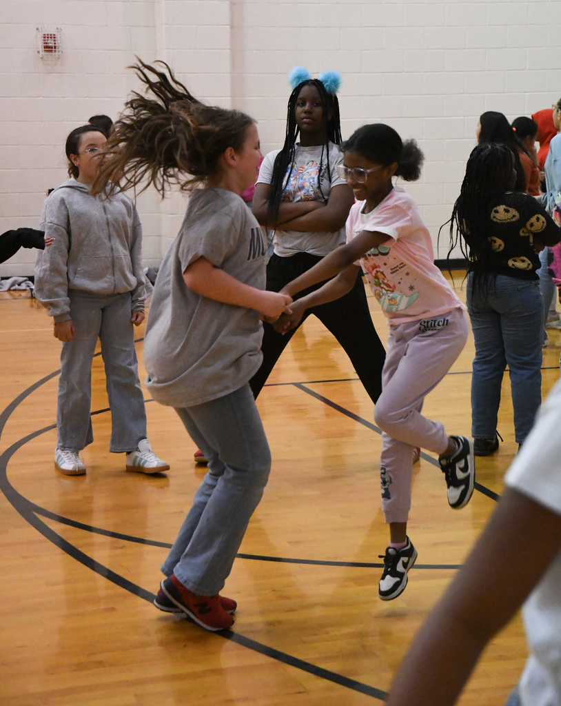two students dancing for fun