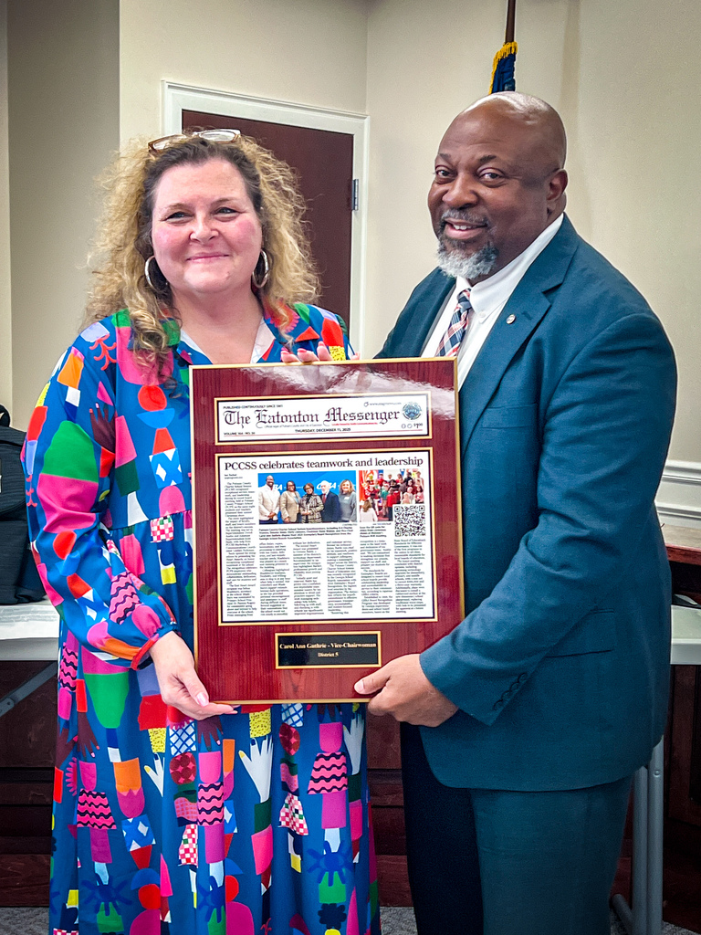 Carol Ann Gutherie receiving plaque in appreciation of her dedication and in recognition of the Board’s achievement as a GSBA Exemplary Board.