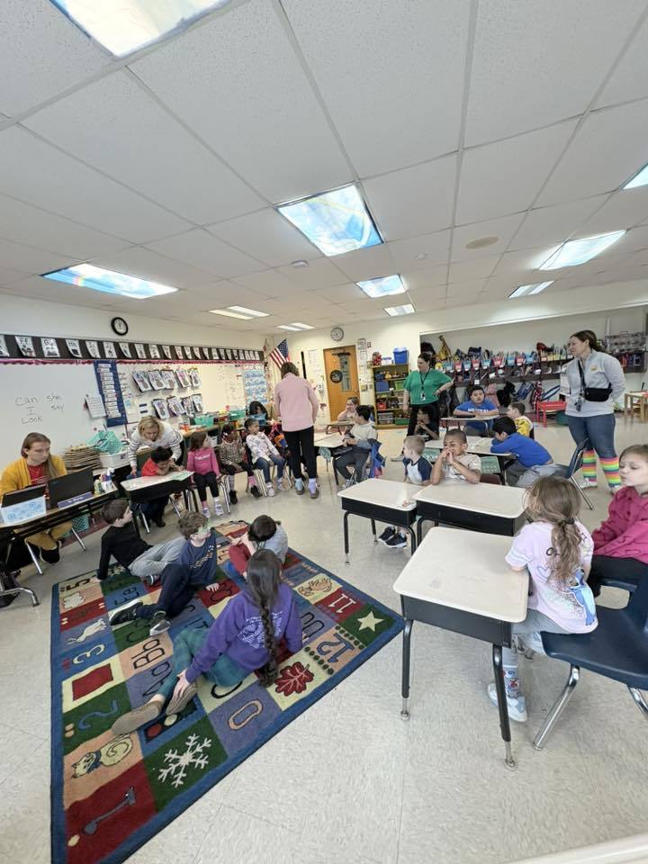 Students sitting in a classroom. 