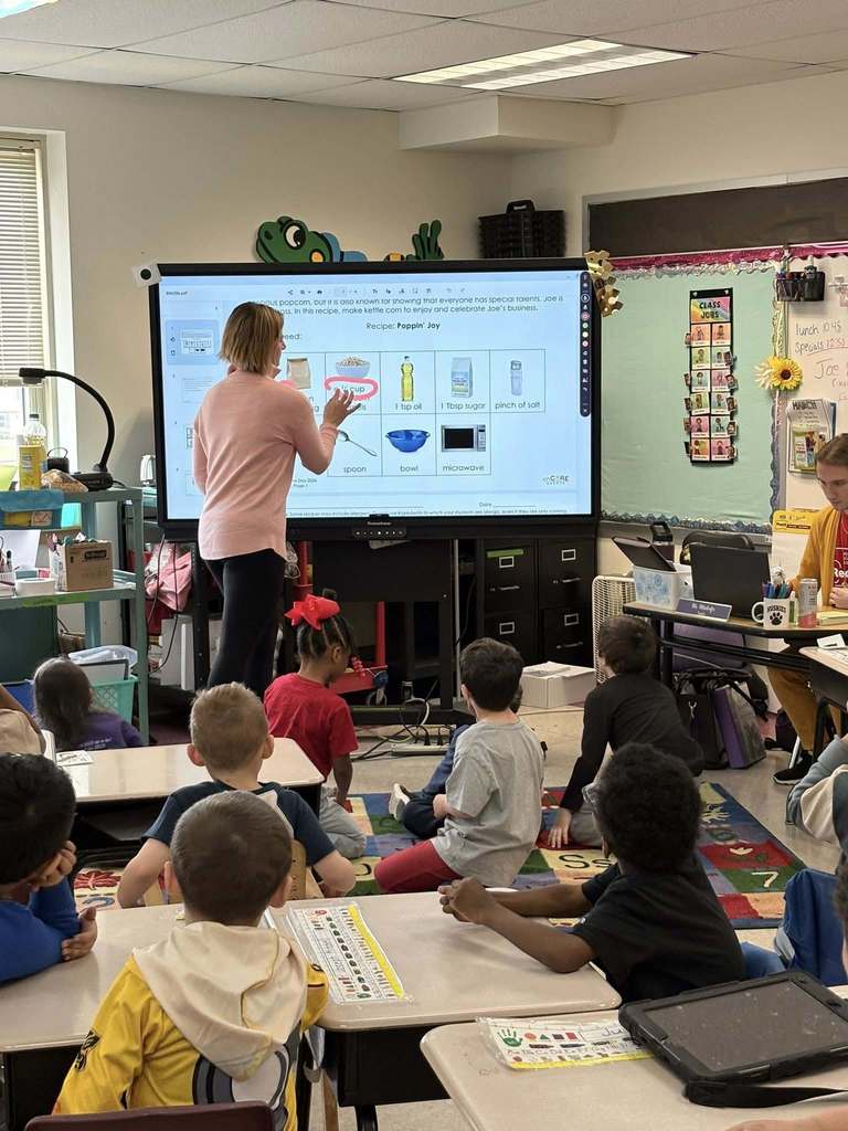 A teacher circling ingredients needed to make the popcorn. 