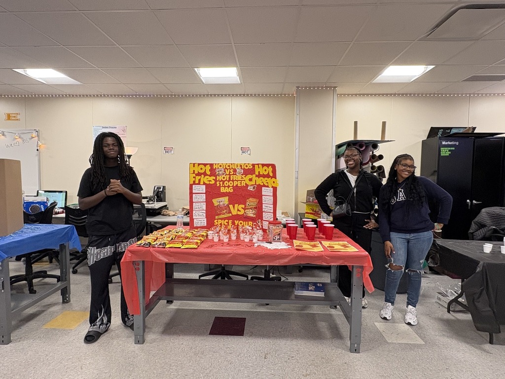 A table for students to choose Hot Cheetos versus Hot Fries. 
