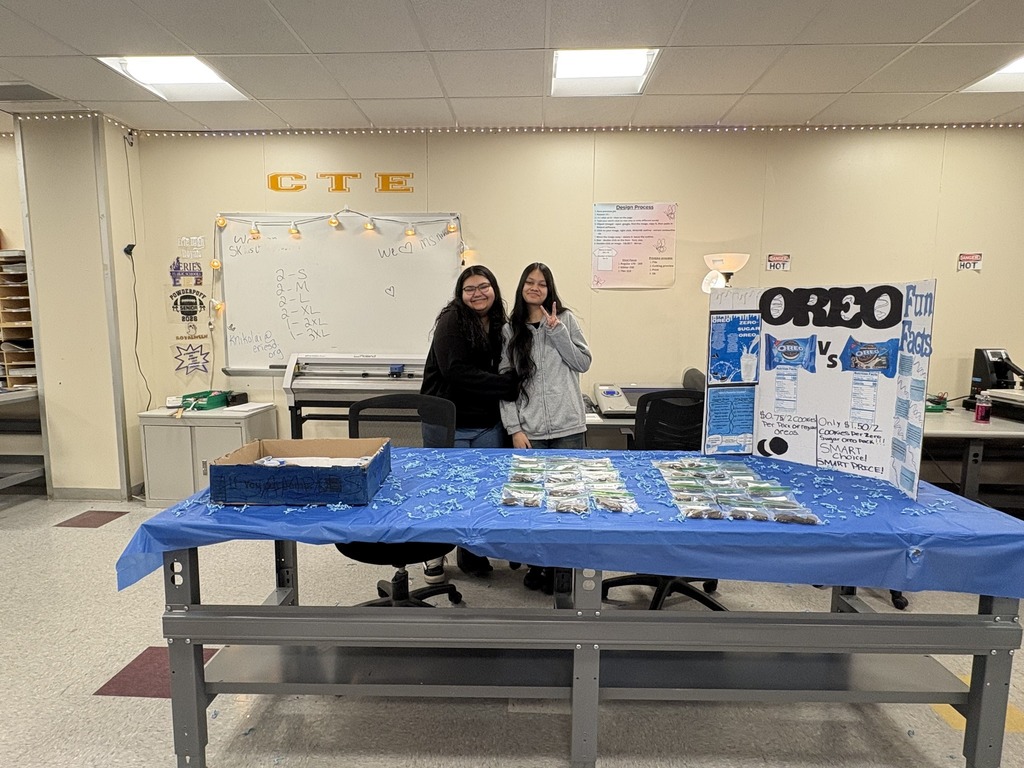 Students hosting a table for different Oreos to see which one people prefer. 