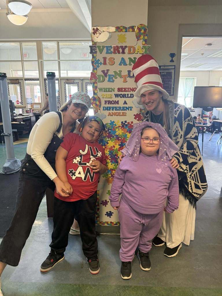 Students and staff wearing fun hats. 