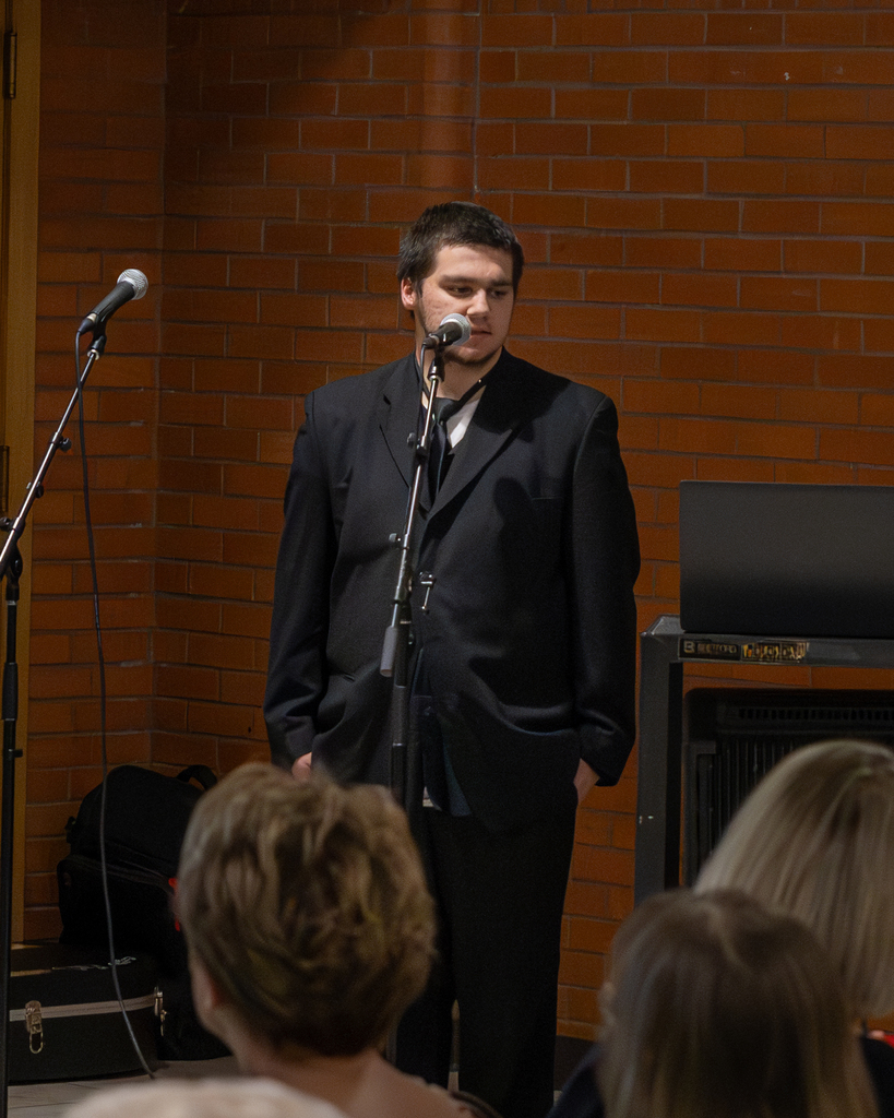 brayden macvenn singing at dinner theater