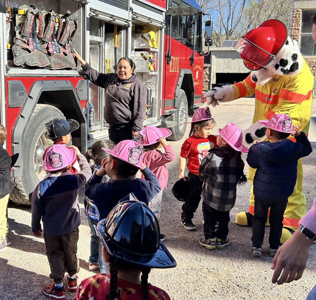 Pre K touring a fire truck
