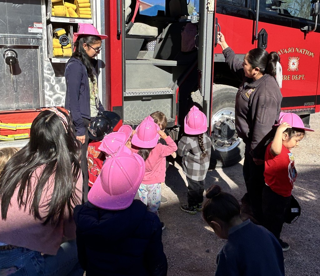 PreK touring a fire truck