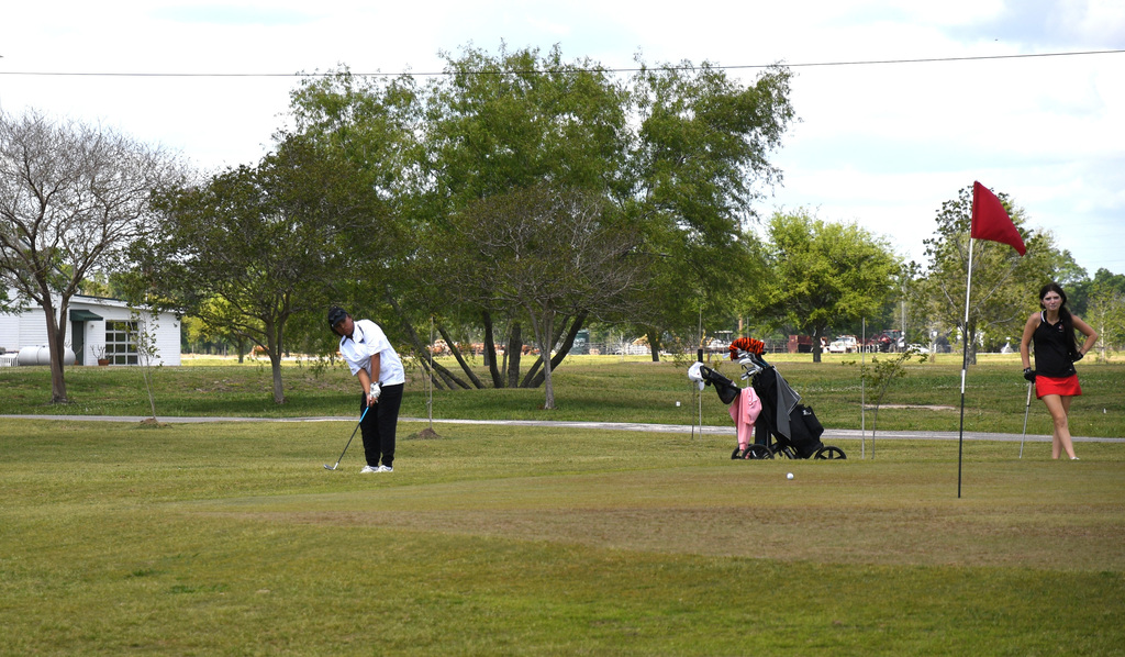 Sophia Ibarra chipping a ball in