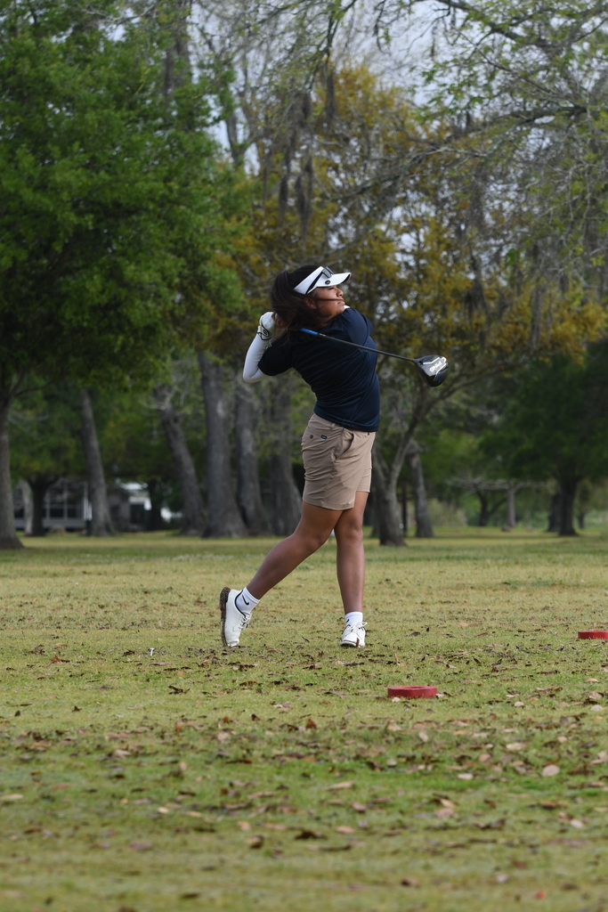 Sophia Ibarra  after a swing in golf