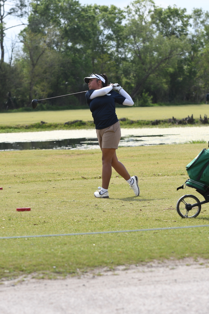 Sophia Ibarra swinging a golf club