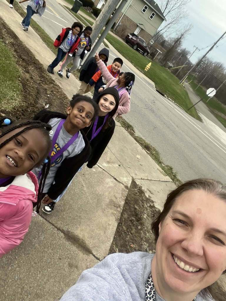 Staff and students on a walk outside. 