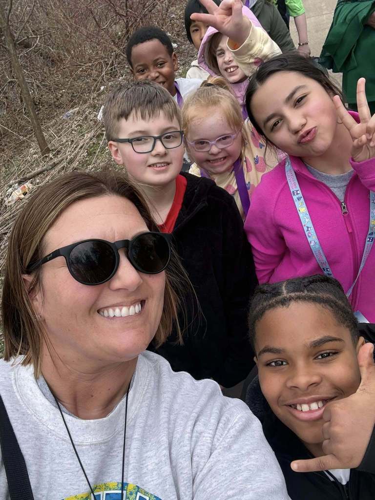 Staff and students on a walk outside. 