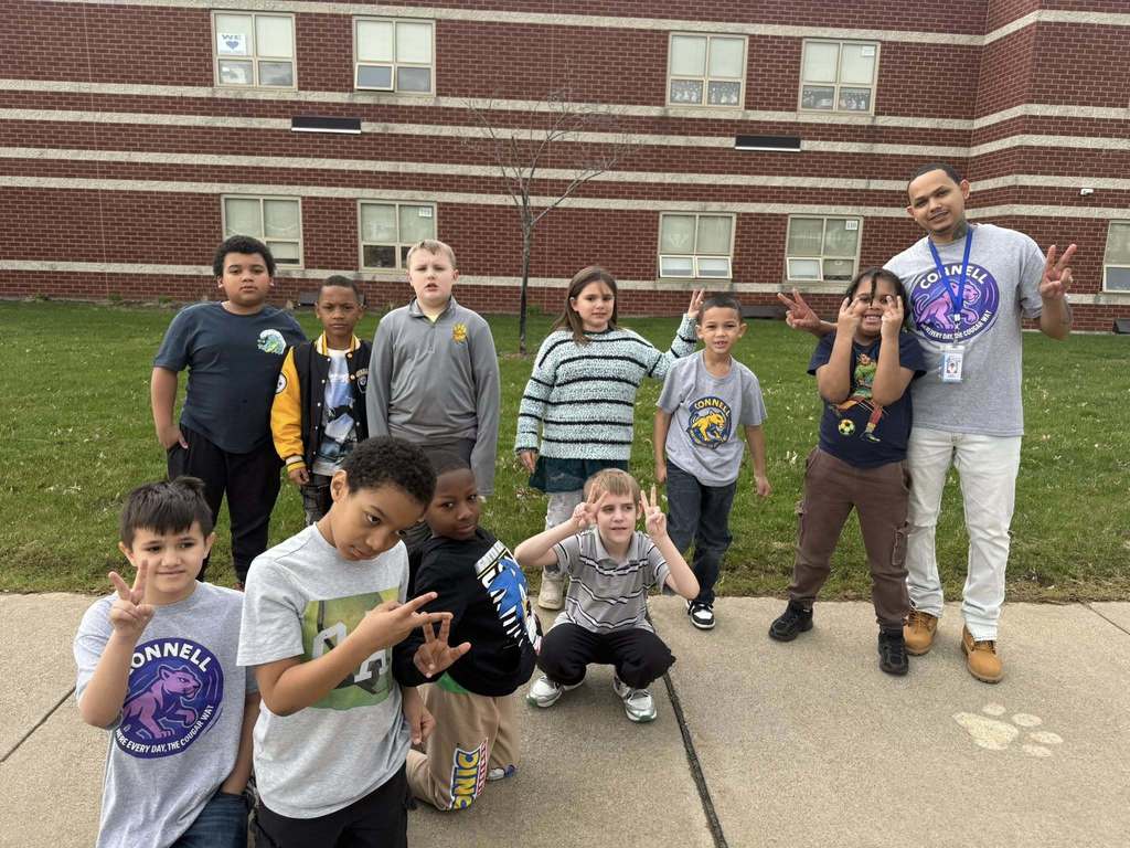 Students posing outside of JoAnna Connell. 