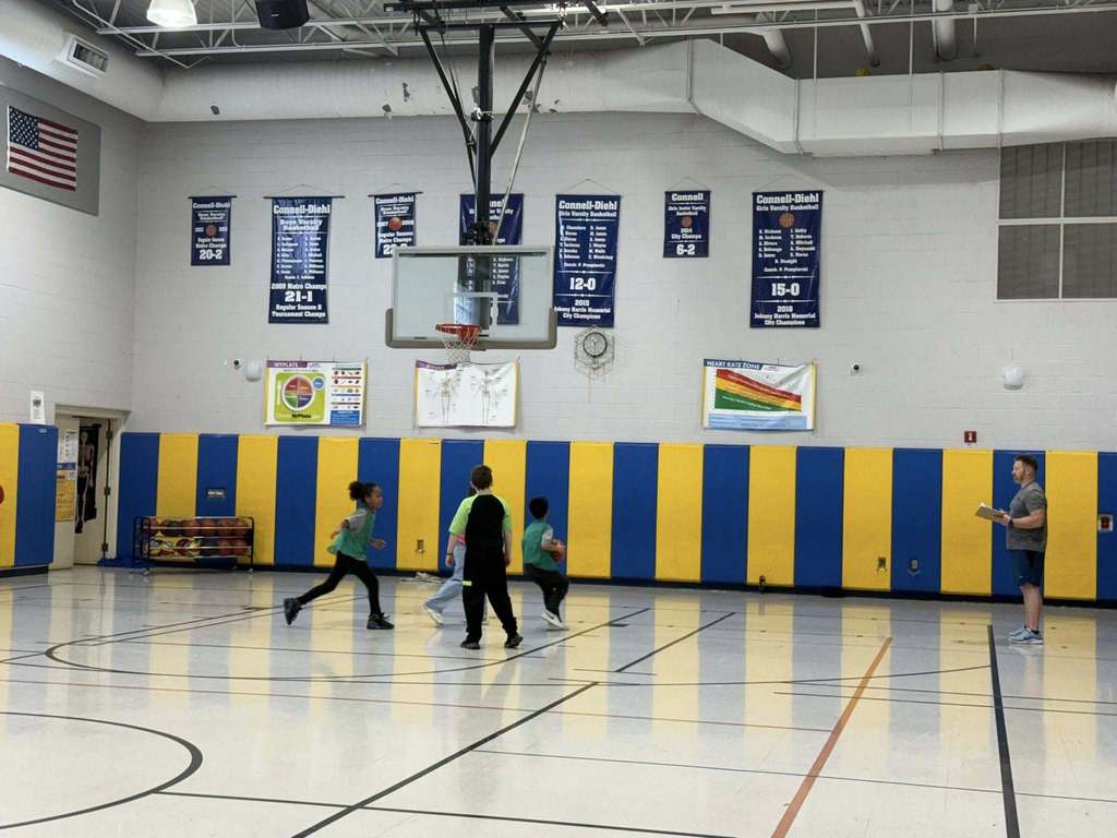 Kids playing basketball in the JoAnna Connell gym. 