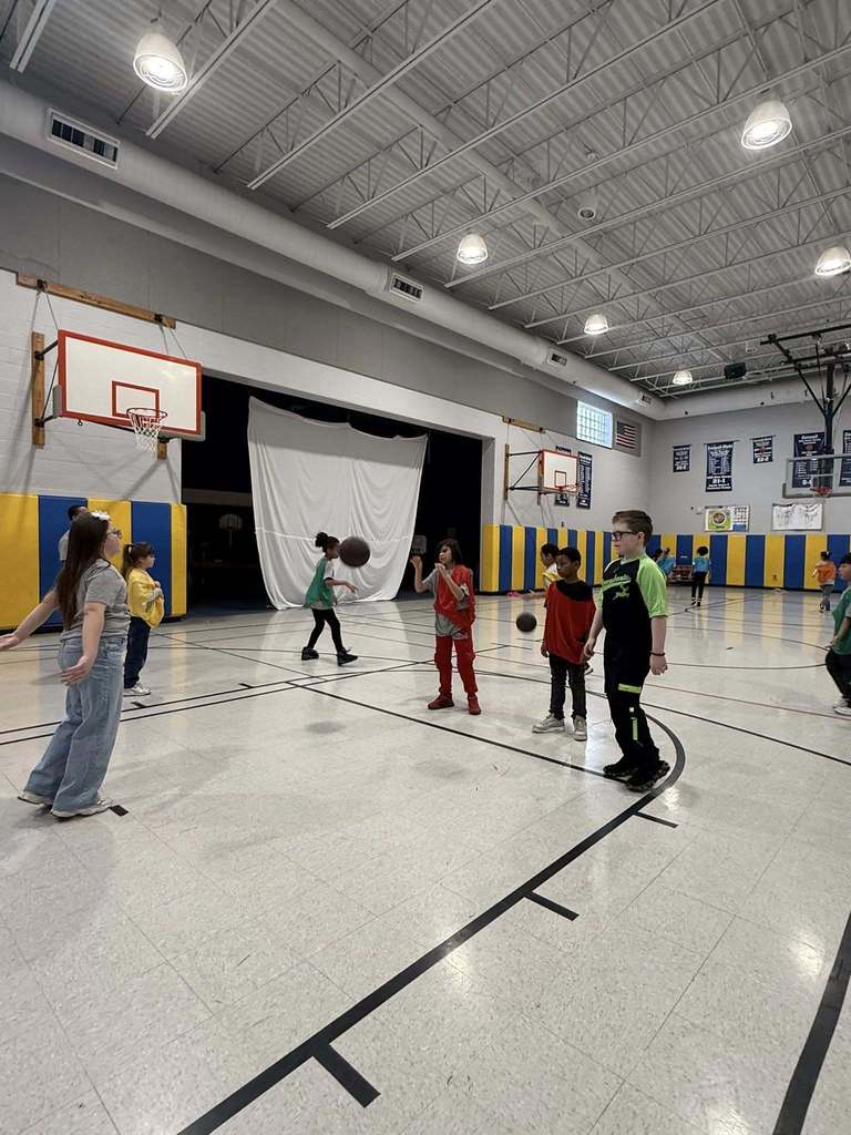 Kids playing basketball in the JoAnna Connell gym. 