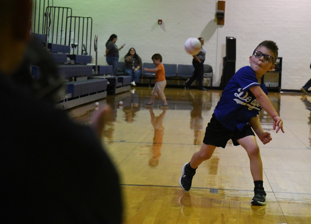 boy throwing baseball