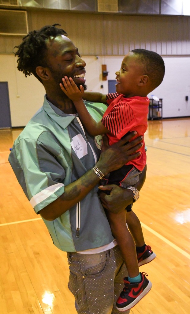 father and son embracing