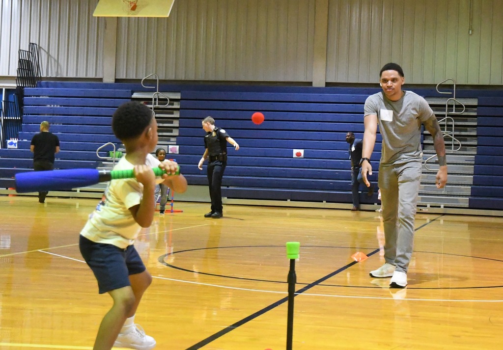 man and son playing baseball activities