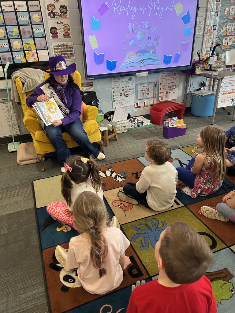 Miss Teen Rodeo, Olivia Bucholtz, reading a book about bunnies to kindergarten students.