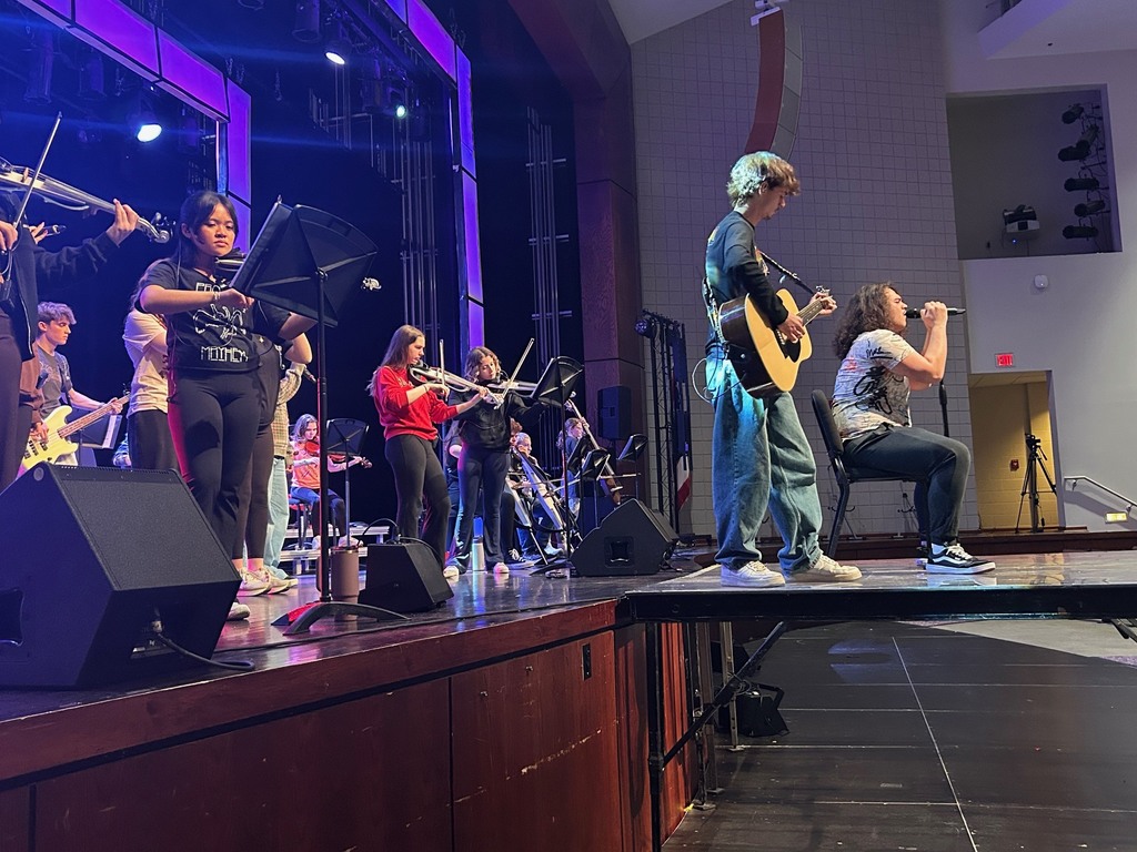 Mayhem practice side view with guitar and vocalist