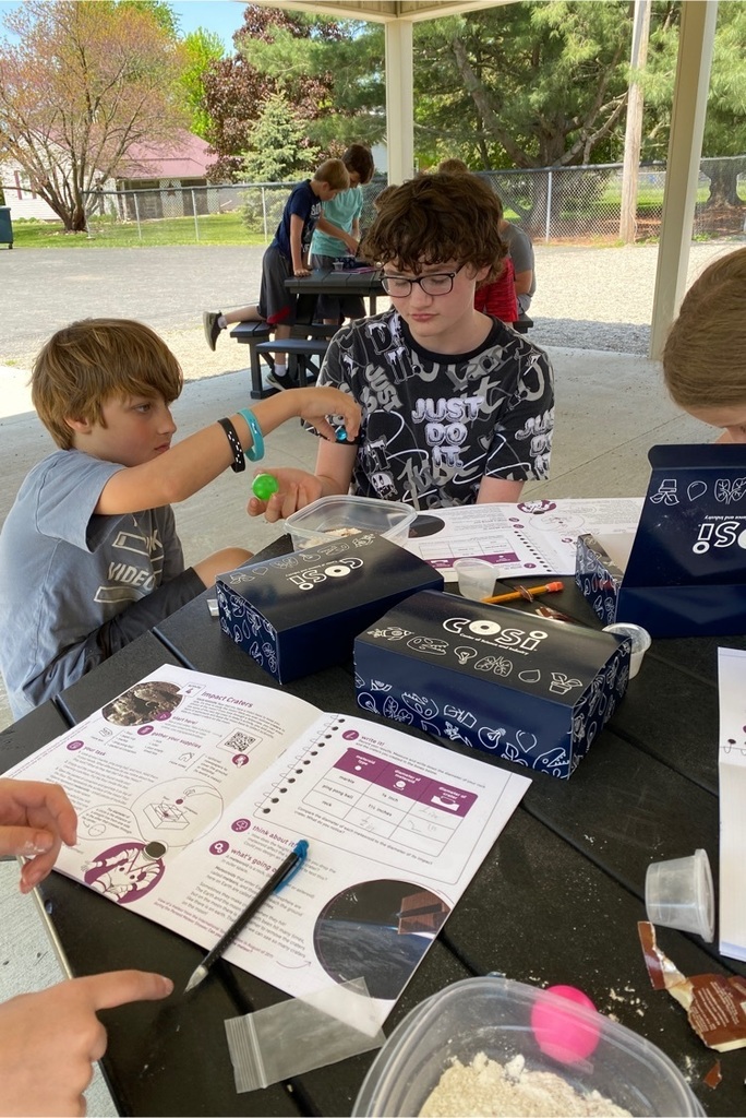 kids with moon surface experiment