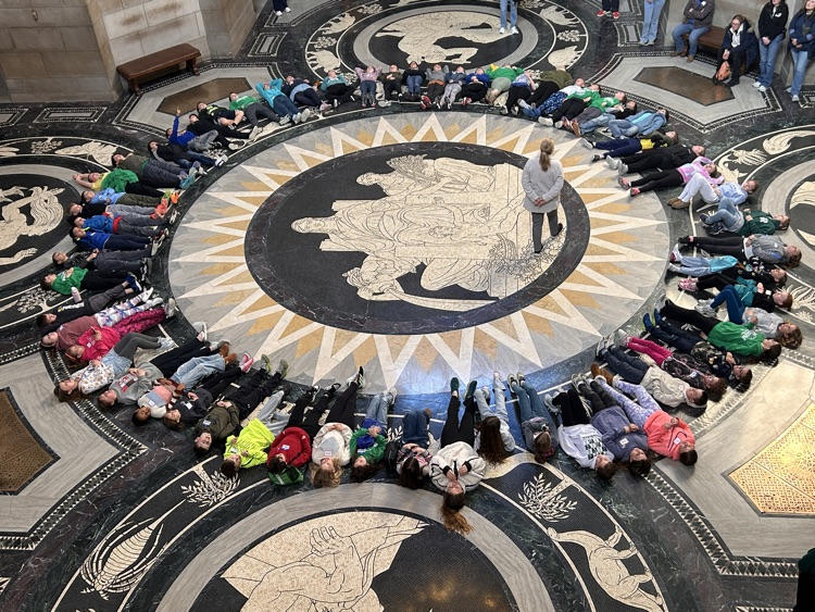 4th Grade taking in the Nebraska Capitol  artwork!