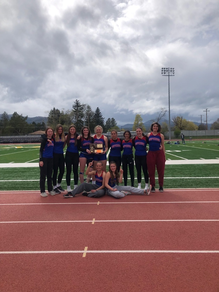 Superior Bobcats girls track and field team pose with the District 14C 1st place plaque