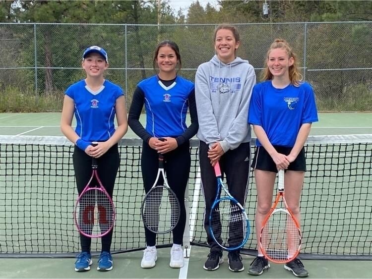 superior bobcats tennis team pose for a photo