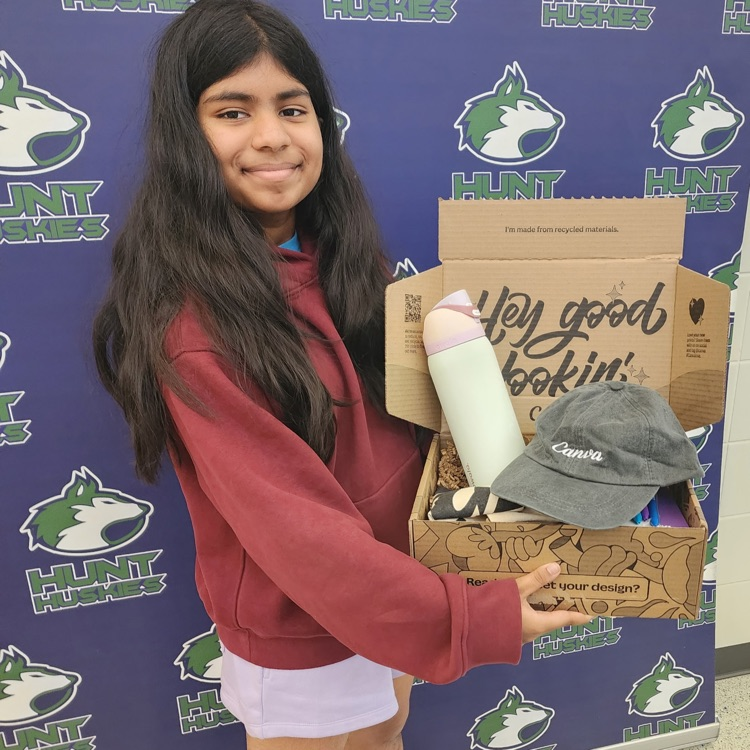 student showing what’s inside canva box