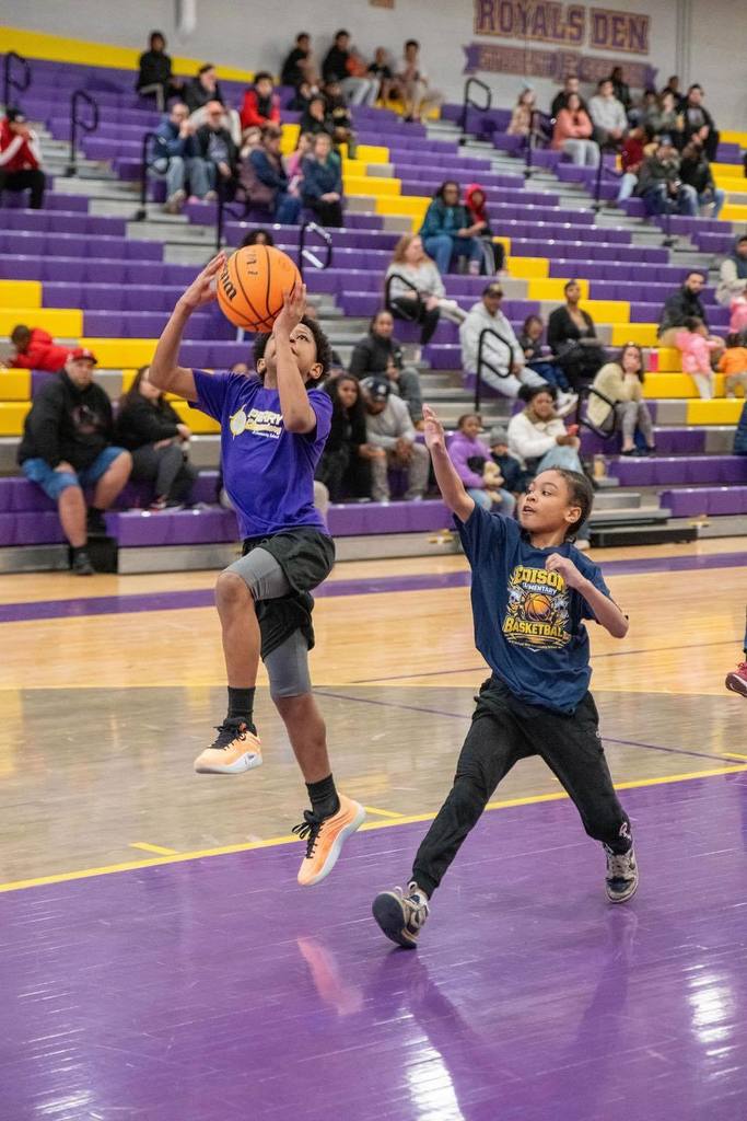 Kids playing basketball. 