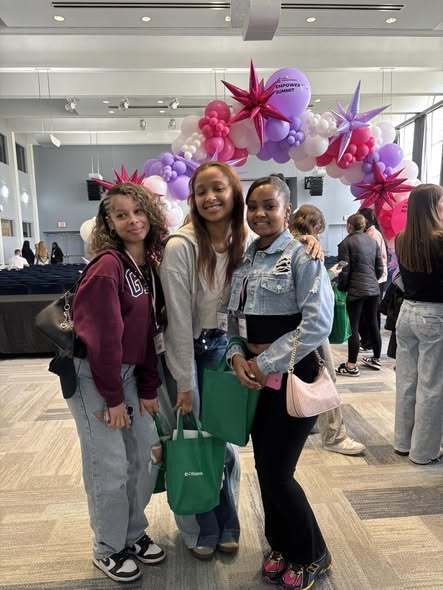 A group of women posing. 