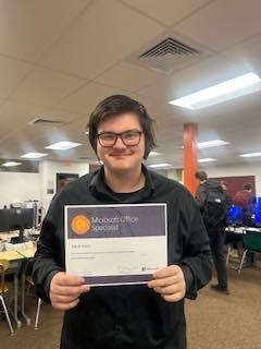 Evan with his certification