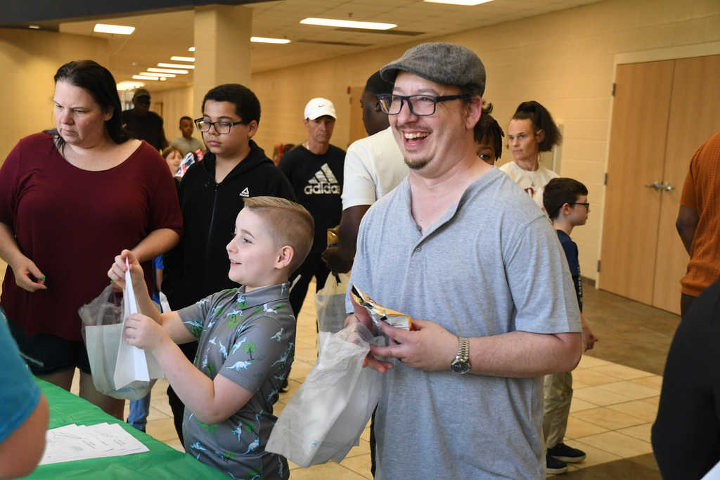 student and father enjoying time together