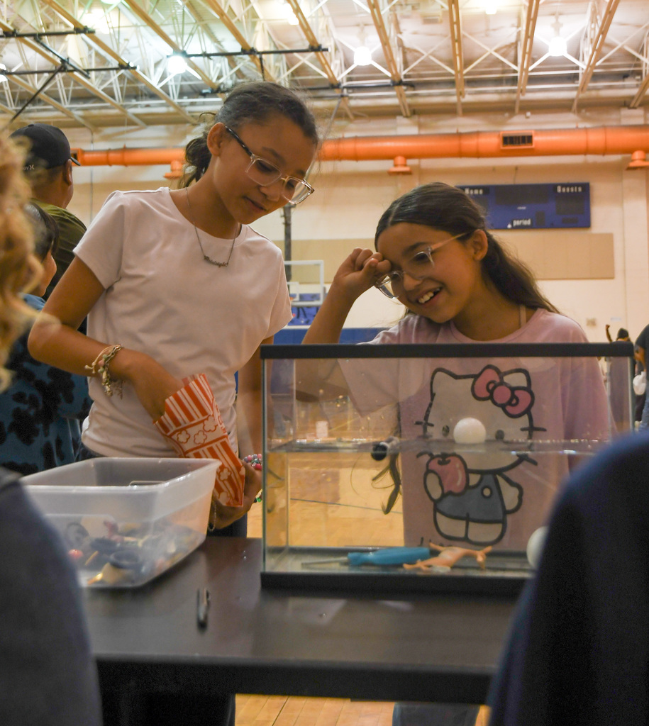 two girls experimenting with bouyancy