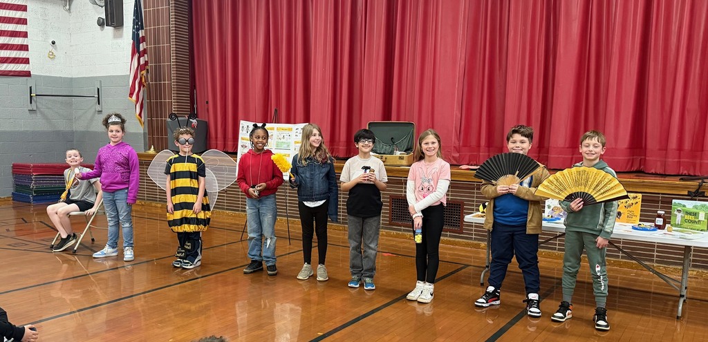 students dressed like all the bees in the hive