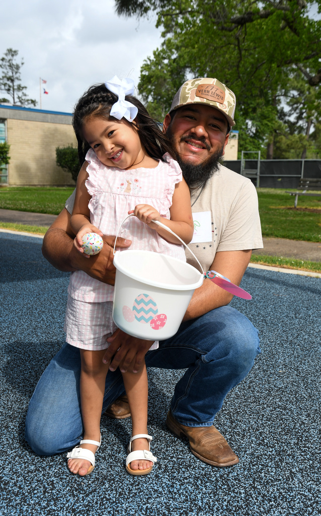 father and daughter after easter egg hunt