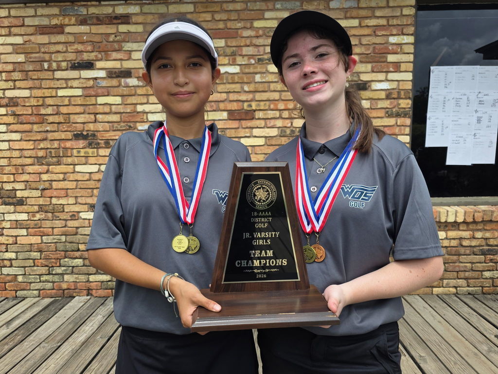 WOS JV Golf Team holding fist place trophy