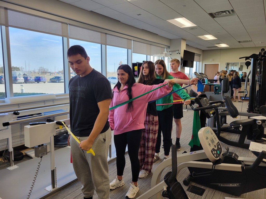 Students utilize resistance bands. 