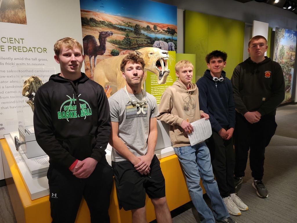 Students with an ancient prairie predator 