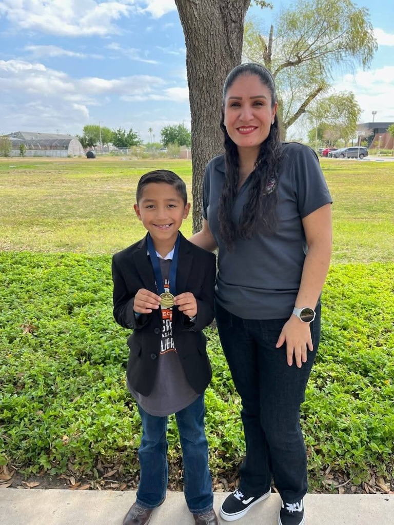 Jonah with metal and Coach Mederes