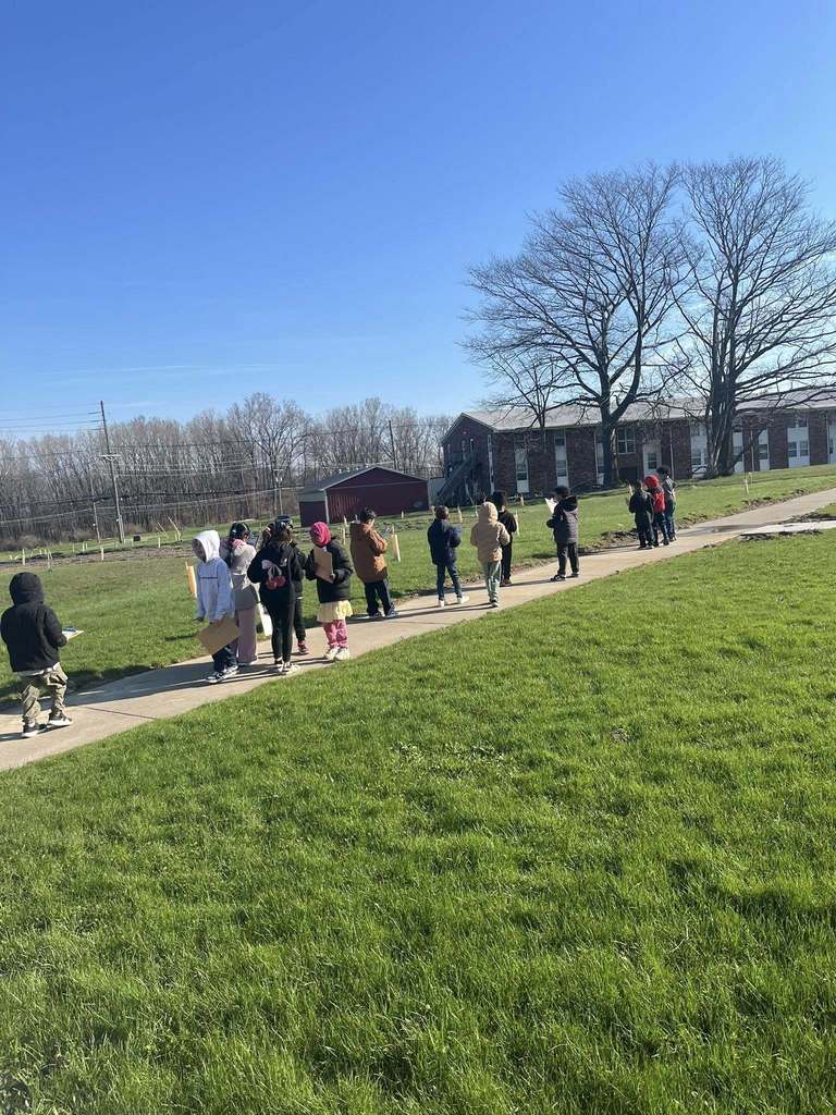 Students walking down a path. 