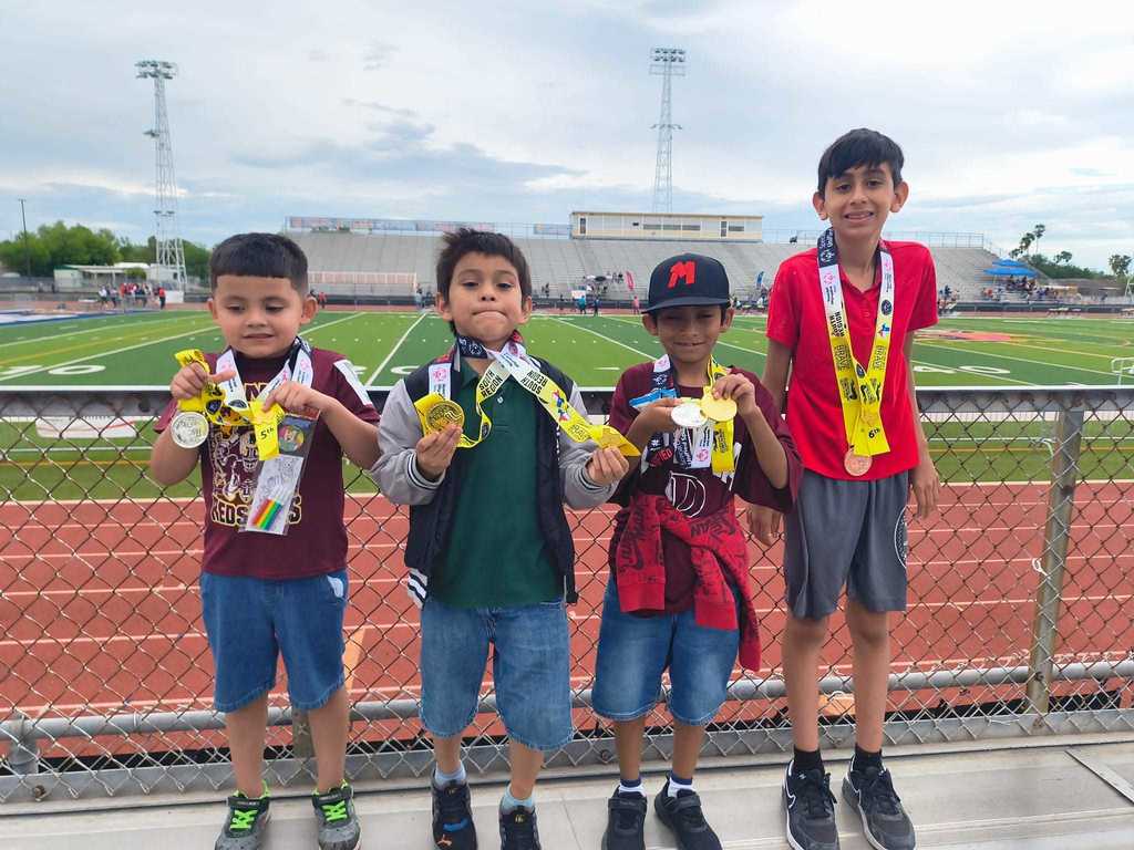 several boys with medals
